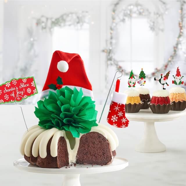 Holiday cake toppers featuring Santa Hat Bundt Cakes with mini stocking and Bundtinis with gnome decorations