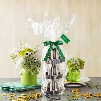 Triple Bundtlet Tower wrapped in cellophane and green ribbon