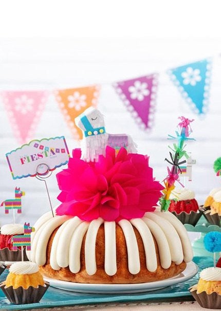 Let the Fiesta Begin Bundt Cake with Fiesta Bundtinis on a decorated table