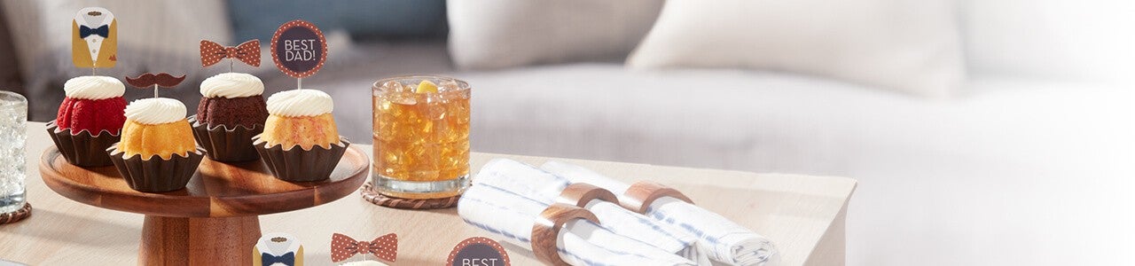 Coffee table featuring Best Dad Bundtinis. Father's Day is 6/15.