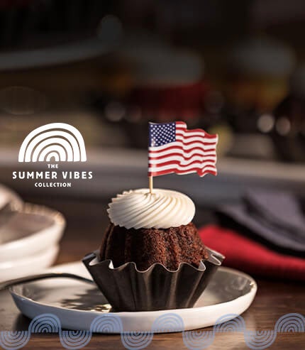 Bundtini with a paper waving flag bundtini topper on a festive holiday table