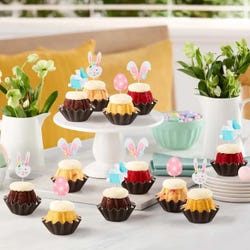 Easter-themed mini Bundt cakes with festive bunny and egg toppers