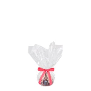 Bundtlet wrapped in cellophane tied together with a red bow