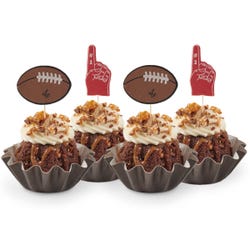 Touchdown Made With SNICKERS® Bundtinis® baked and filled with chopped SNICKERS® Bars, topped with frosting and drizzled with caramel sauce. They are decorated with a football topper and a #1 foam finger.