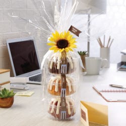 Three personal-size bundt cakes stacked vertically