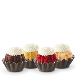 Assorted flavors mini-bundt cakes - showing four in the image. Full assortment is customizable and comes with 12 Bundtinis